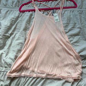 NWT pink tank with detailing on bottom